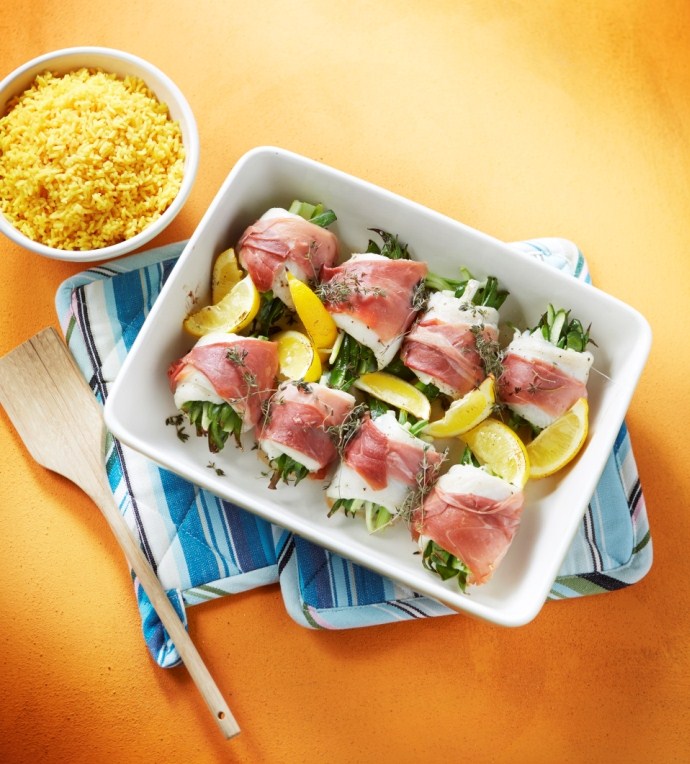 Visrolletjes met lentegroenten in parmaham